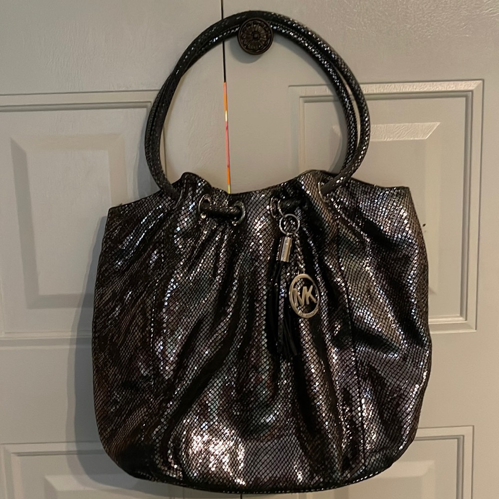 Michael Kors Purse and Wallet.  Purse slightly Used.  Wallet like new.